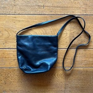 Baggu mini cross body bag, black 100% leather. Unlined, great condition.